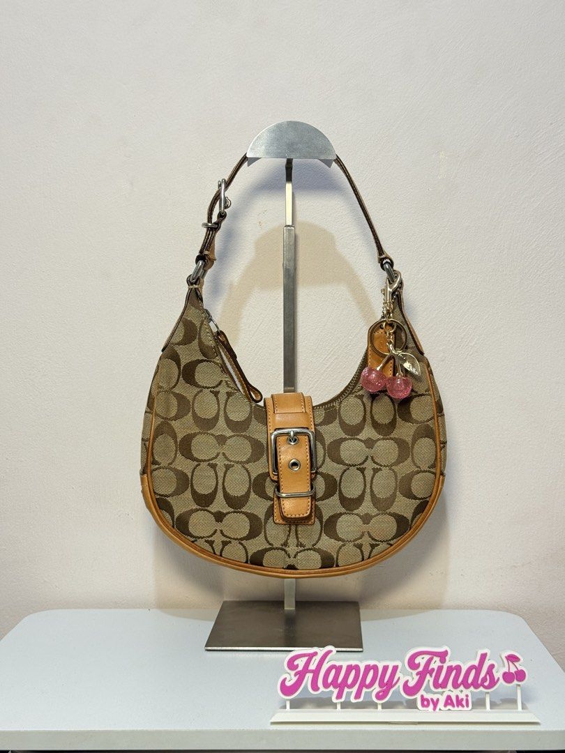 Coach Soho Buckle Shoulder Bag (Category: Luxury Bags & Wallets) located in Manila. Submitted by happyfindsbyaki (Listing ID 1465191309, Image 1). Description: ୨୧ Coach Soho Buckle Shoulder Bag ୨୧ 🎀 DM to Mine ₊˚⊹ Condition: Rank AB⊹˚₊ ♡ Minimal signs of use ♡ Needs cleaning ♡ YKK zipper ♡Clean interior ♡Clean canvas no rubs 📍 Metro Manila, Las piñas city 𐙚 IG: @happyfinds.byaki 𐙚 FB: Happy Finds by Aki Accessories not included 🍒.