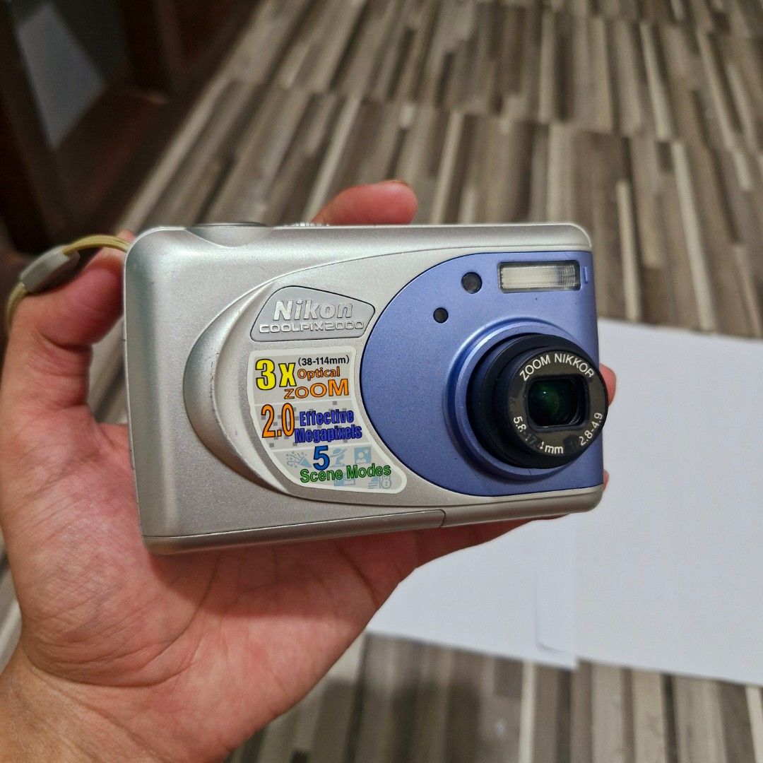 (COD AVAILABLE!!!) Nikon Coolpix 2000 Digicam (Category: Cameras) located in Caloocan City. Submitted by konan_11359 (Listing ID 1465339002, Image 2). Description: (COD AVAILABLE!!!) Nikon Coolpix 2000 Digicam WHY CHOOSE THIS: ♡ Malakas na Flash ♡ Malinaw na output ♡ Many modes to play with. ♡ Matagal malowbat (depends sa batt) ♡ Smooth control and picture ♡ Slim and Compact ♡ Vintage Video from cam ♡ Vintage cam feel Condition: Used! All buttons