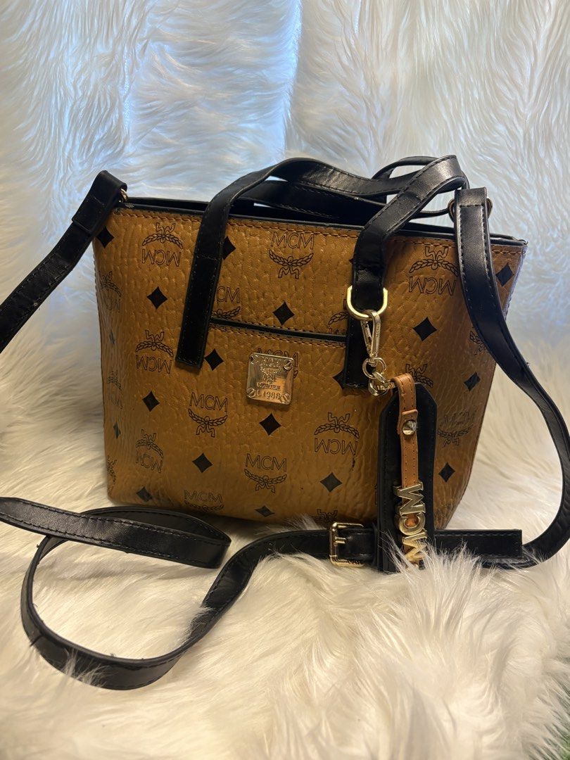 Coded mcm sling bag semi med (Category: Cross-body Bags) located in Davao. Submitted by emmanuelchuamellorin23 (Listing ID 1465195062, Image 2). Description: Coded mcm sling bag semi med super pretty makapal mabigat.