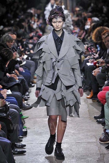 Comme des Garcons A/W13 - Runway Canvas Platform Sneakers (Category: Sneakers) located in Los Banos. Submitted by declutterking (Listing ID 1465211720, Image 2). Description: Size 24.0cm on tag • look 2 of Autumn/Winter 2013 runway • canvas material • platform style • pair only Dimensions: 3.8" sole height Used condition Authentic.