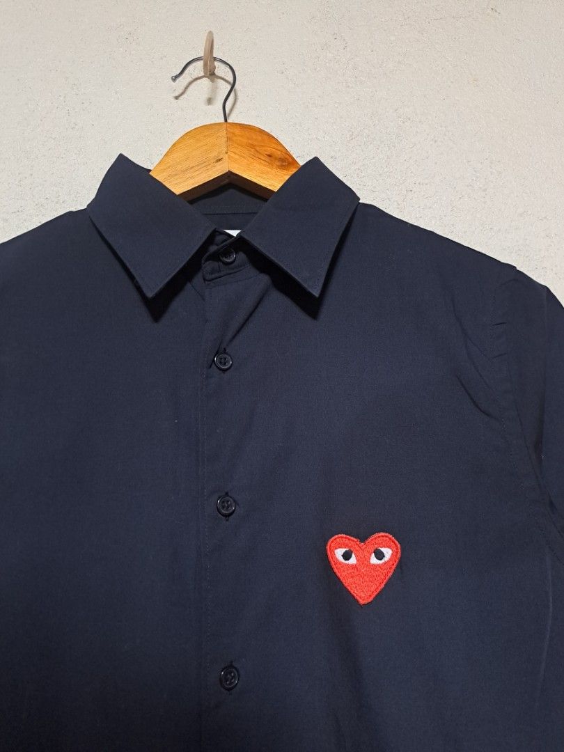 Comme Des Garcons PLAY Button down (Category: Formal Shirts) located in Dumaguete. Submitted by jayarbajad49160 (Listing ID 1465289060, Image 2). Description: Comme Des Garcons PLAY Button down As jew Condition Color rate:9.8/10 No issue Size Small Width:19 Length:27 Loc dumaguete city visayas.