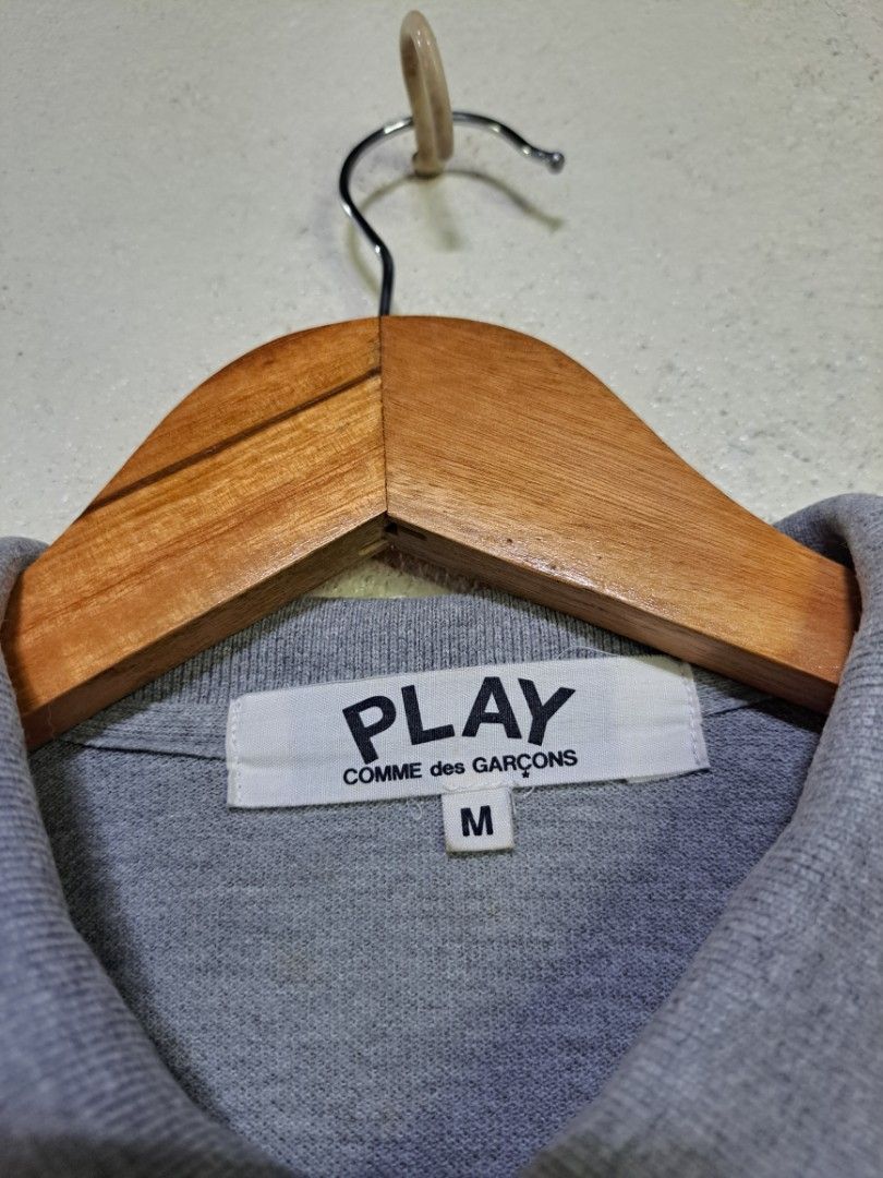 Comme Des Garcons PLAY Polo Shirt (Category: Shirts) located in Dumaguete. Submitted by jayarbajad49160 (Listing ID 1465318749, Image 3). Description: Comme Des Garcons PLAY Polo Shirt - 600 add sf Excellent Condition Color rate:9.8/10 No issue Size Medium Width:17 Length:22 Loc dumaguete city visayas.