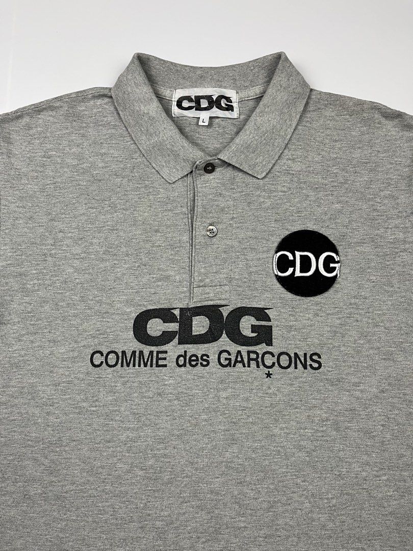 CDG — Comme des Garçons Script S/S Polo Shirt (Category: Tshirts & Polo Shirts ) located in Puerto Princesa. Submitted by paradise5300 (Listing ID 1465211264, Image 3). Description: CDG — Comme des Garçons Script S/S Polo Shirt Tagged Size: Large Dimensions Inches length: 26.5 Inches width: 21 Condition: Very good Color rate: 9.5 Flaws: Minor sign of usage 1,999 shipping fee is not yet included. .