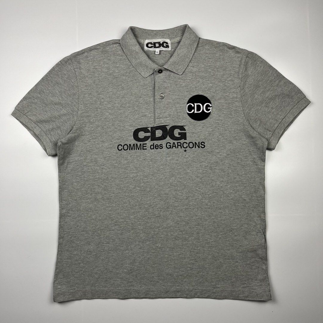 CDG — Comme des Garçons Script S/S Polo Shirt (Category: Tshirts & Polo Shirts ) located in Puerto Princesa. Submitted by paradise5300 (Listing ID 1465211264, Image 1). Description: CDG — Comme des Garçons Script S/S Polo Shirt Tagged Size: Large Dimensions Inches length: 26.5 Inches width: 21 Condition: Very good Color rate: 9.5 Flaws: Minor sign of usage 1,999 shipping fee is not yet included. .