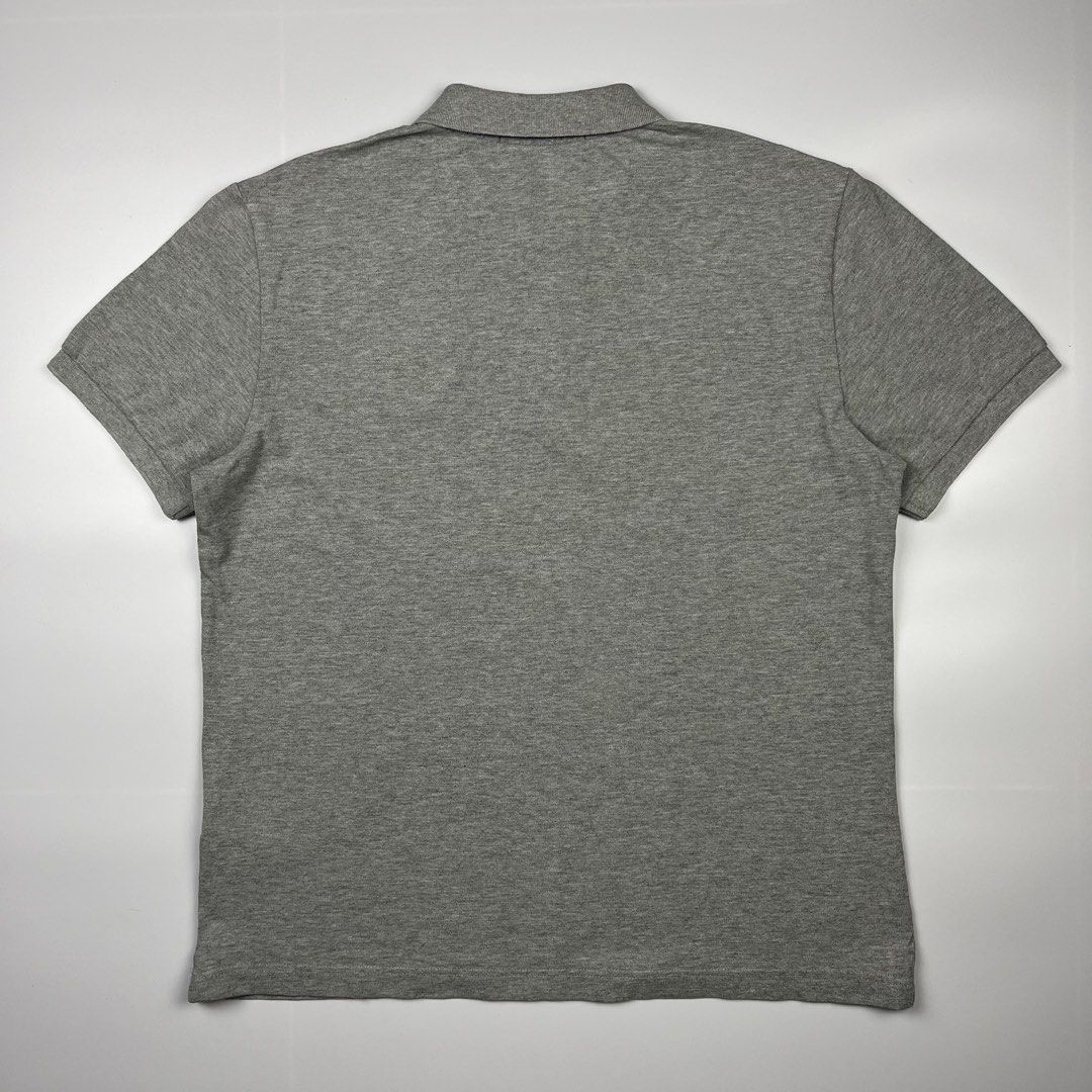 CDG — Comme des Garçons Script S/S Polo Shirt (Category: Tshirts & Polo Shirts ) located in Puerto Princesa. Submitted by paradise5300 (Listing ID 1465211264, Image 2). Description: CDG — Comme des Garçons Script S/S Polo Shirt Tagged Size: Large Dimensions Inches length: 26.5 Inches width: 21 Condition: Very good Color rate: 9.5 Flaws: Minor sign of usage 1,999 shipping fee is not yet included. .