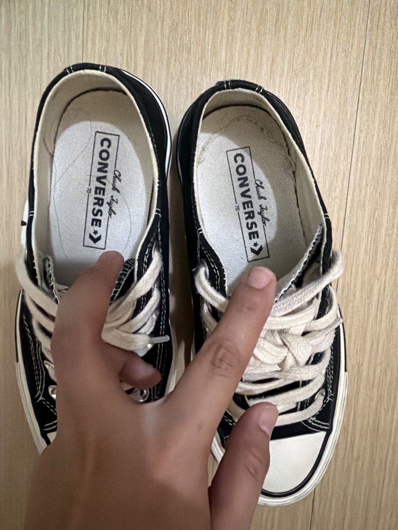 Converse Chuck 70 De Luxe Squared Black Low Top (Category: Sneakers) located in San Jose del Monte. Submitted by ariathriftshop (Listing ID 1465381103, Image 3). Description: - Brand/Model: Converse Low Tops with Warped Rubber Midsoles - Color: Black canvas with white contrast stitching and geometric overlays - Details: Thick cream laces, classic Chuck Taylor ankle patches, and branded woven insoles - Soles: Brown rubber outsoles with star patter