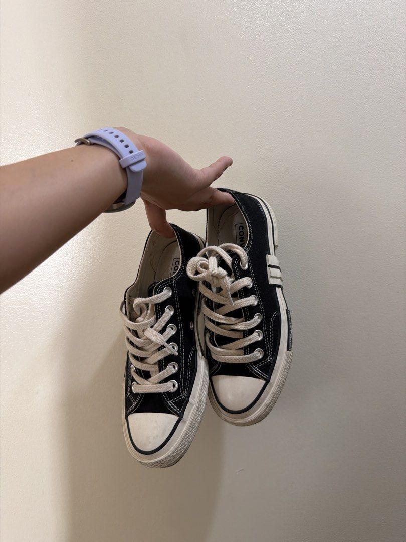 Converse Chuck 70 De Luxe Squared Black Low Top (Category: Sneakers) located in San Jose del Monte. Submitted by ariathriftshop (Listing ID 1465381103, Image 1). Description: - Brand/Model: Converse Low Tops with Warped Rubber Midsoles - Color: Black canvas with white contrast stitching and geometric overlays - Details: Thick cream laces, classic Chuck Taylor ankle patches, and branded woven insoles - Soles: Brown rubber outsoles with star patter