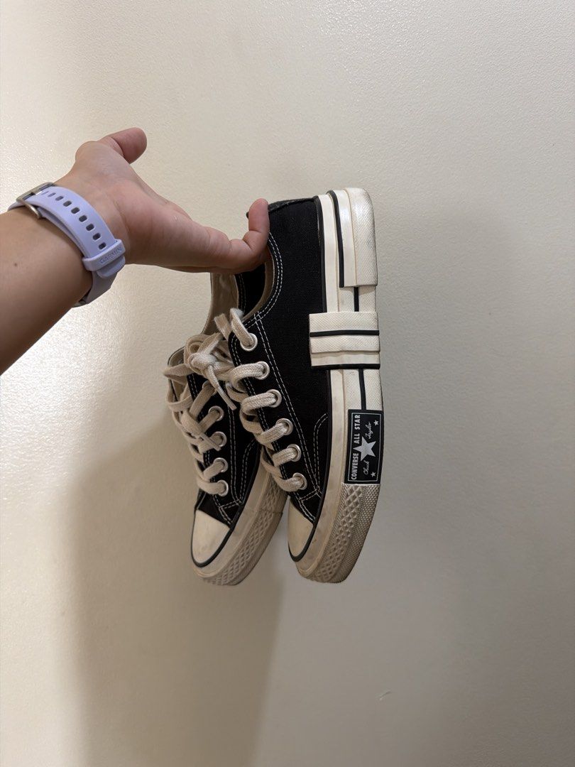 Converse Chuck 70 De Luxe Squared Black Low Top (Category: Sneakers) located in San Jose del Monte. Submitted by ariathriftshop (Listing ID 1465381103, Image 2). Description: - Brand/Model: Converse Low Tops with Warped Rubber Midsoles - Color: Black canvas with white contrast stitching and geometric overlays - Details: Thick cream laces, classic Chuck Taylor ankle patches, and branded woven insoles - Soles: Brown rubber outsoles with star patter