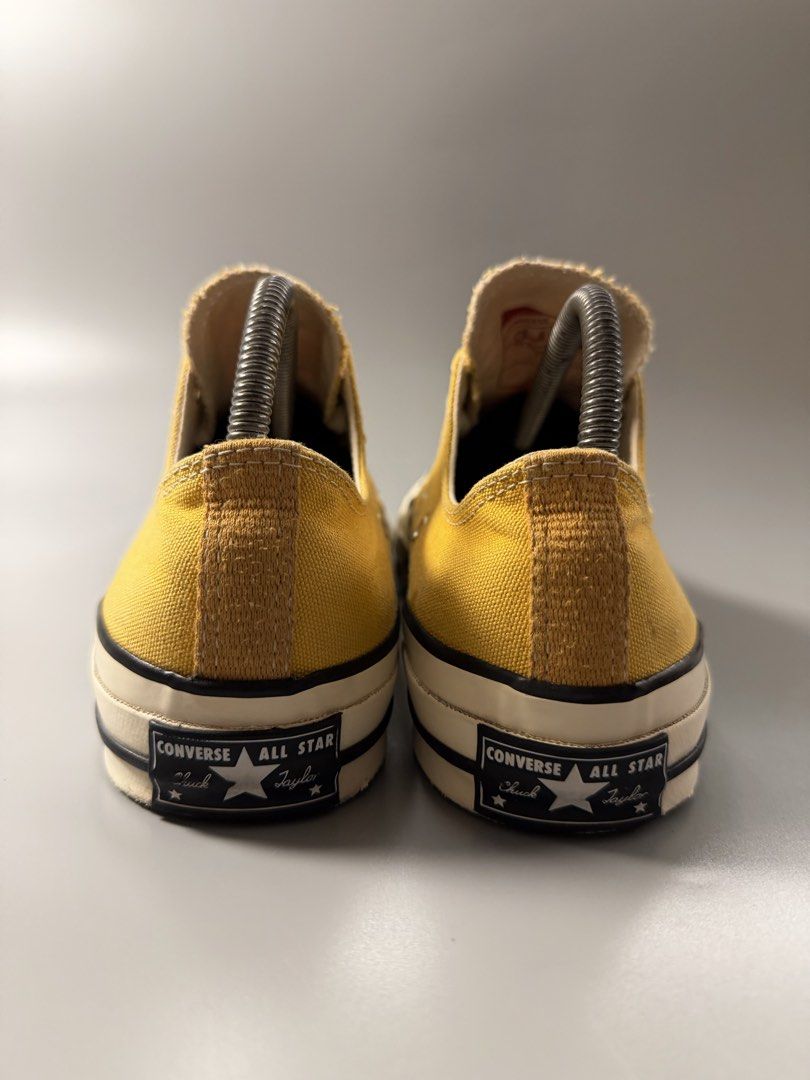 Converse Chuck 70 Low Sun Flower Yellow (Category: Sneakers) located in Caloocan City. Submitted by maempenafi21452 (Listing ID 1465281931, Image 3). Description: - Brand/Model: Converse Chuck 70 Low-Top - Color: Vibrant Yellow - Size: US Men's 8 / Women's 10 - Condition: Gently worn a couple of times, super clean soles with minimal tread wear - Features: Classic canvas upper, glossy rubber midsole, vintage heel license plate, and comfortable Ort