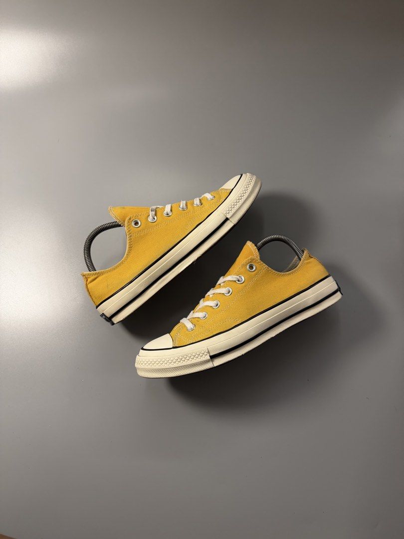 Converse Chuck 70 Low Sun Flower Yellow (Category: Sneakers) located in Caloocan City. Submitted by maempenafi21452 (Listing ID 1465281931, Image 1). Description: - Brand/Model: Converse Chuck 70 Low-Top - Color: Vibrant Yellow - Size: US Men's 8 / Women's 10 - Condition: Gently worn a couple of times, super clean soles with minimal tread wear - Features: Classic canvas upper, glossy rubber midsole, vintage heel license plate, and comfortable Ort