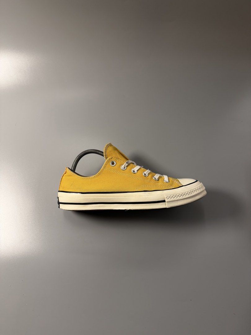 Converse Chuck 70 Low Sun Flower Yellow (Category: Sneakers) located in Caloocan City. Submitted by maempenafi21452 (Listing ID 1465281931, Image 2). Description: - Brand/Model: Converse Chuck 70 Low-Top - Color: Vibrant Yellow - Size: US Men's 8 / Women's 10 - Condition: Gently worn a couple of times, super clean soles with minimal tread wear - Features: Classic canvas upper, glossy rubber midsole, vintage heel license plate, and comfortable Ort