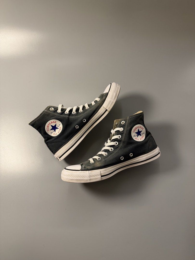 Converse Chuck Taylor All Star High Top Dark Grey (Category: Sneakers) located in Caloocan City. Submitted by maempenafi21452 (Listing ID 1465281367, Image 1). Description: - Brand: Converse Chuck Taylor All Star - Style: High top sneakers in dark grey canvas with white laces and contrast stitching - Size: US Men's 7.5 / Women's 9.5 (indicated on tongue tag) - Condition: Minor wear on soles, clean traction patterns, rubber toe cap intact - Featur