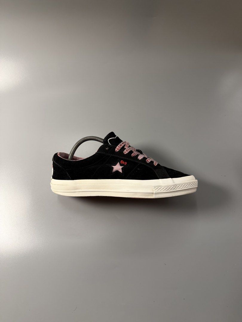 Converse x Hello Kitty One Star Black Pink (Category: Sneakers) located in Quezon City. Submitted by markieexp (Listing ID 1465284080, Image 2). Description: - Brand: Converse x Kitty Collaboration - Color: Black with pink accents - Material: Suede upper - Size: Men's US 7.5 / Women's US 9.5 / EUR 41 - Design details: Pink star logo with bow, Kitty heel & insole graphics, polka dot lining, and pink patterned laces - Condition: Clean uppers, minor
