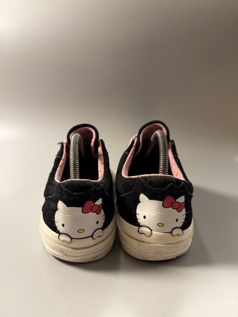 Converse x Hello Kitty One Star Black Pink (Category: Sneakers) located in Quezon City. Submitted by markieexp (Listing ID 1465284080, Image 3). Description: - Brand: Converse x Kitty Collaboration - Color: Black with pink accents - Material: Suede upper - Size: Men's US 7.5 / Women's US 9.5 / EUR 41 - Design details: Pink star logo with bow, Kitty heel & insole graphics, polka dot lining, and pink patterned laces - Condition: Clean uppers, minor
