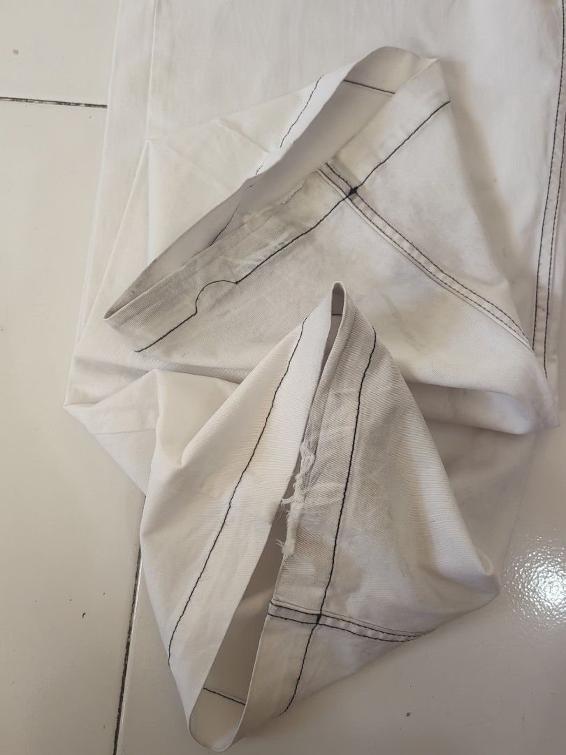 VANS Pants. (Category: Jeans) located in Manila. Submitted by livedolphin_68dee2 (Listing ID 1463481643, Image 2). Description: - Cream colored cargo pants - Wide leg fit - Contrast stitching detail - Two front pockets - Two cargo pockets on legs - Button and zip closure - Ideal for a casual streetwear style.