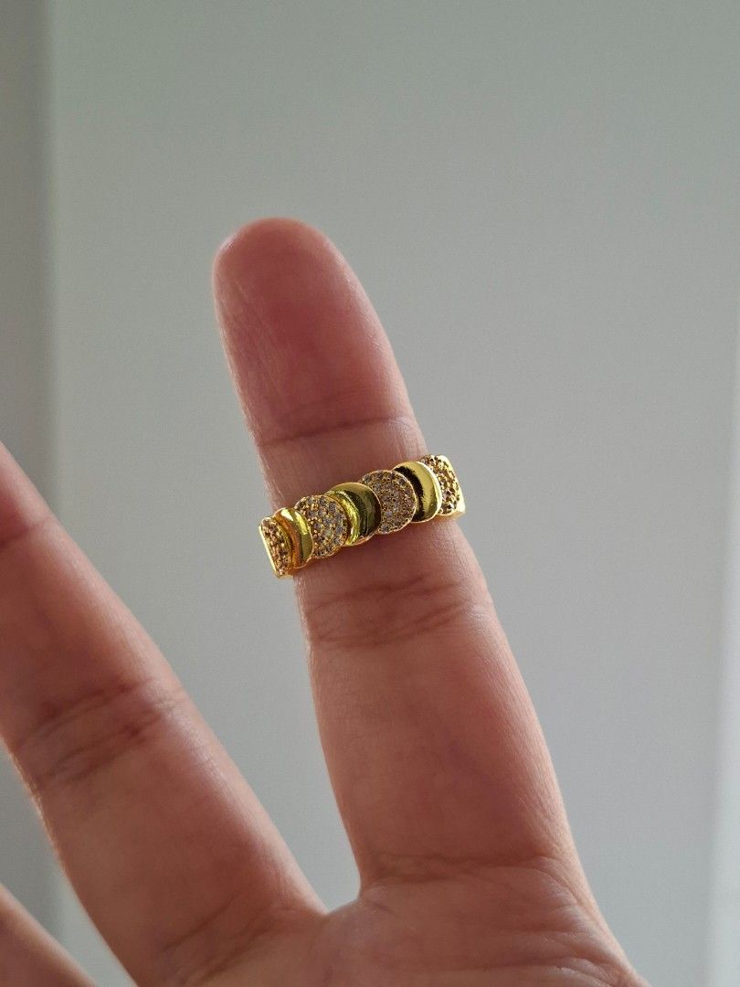 Crescent Moon with Alternating Stone Designs Gold Adjustable Ring (Category: Rings) located in Dasmarinas. Submitted by danabrie22 (Listing ID 1465227798, Image 1). Description: adjustable size 5 - 9 very well-made, excellent crafstmanship 10/10 condition brand new stainless steel & white-colored cubic zirconia stones made in Hongkong.