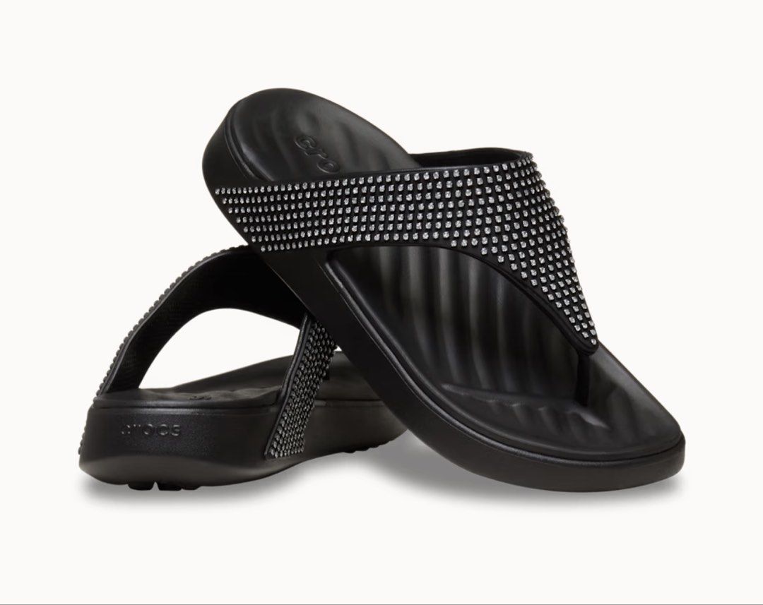 Crocs Getaway Triangle Flip Gems Black (Category: Slippers and slides) located in Dasmarinas. Submitted by toyang50 (Listing ID 1465178062, Image 3). Description: Black Crocs sandals with sparkly rhinestone gems along the strap. Free Feel technology for ultimate comfort and flexibility. Brand new with tag attached. Super lightweight slip-on style. Great everyday footwear with some sparkle..
