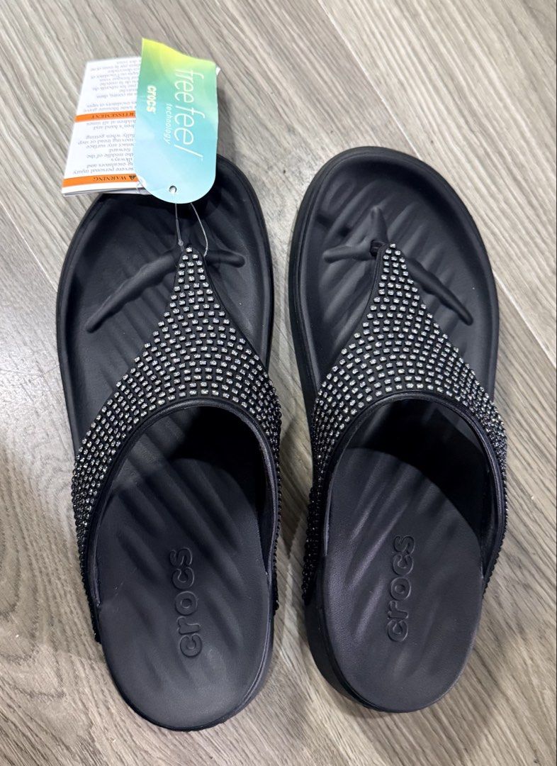 Crocs Getaway Triangle Flip Gems Black (Category: Slippers and slides) located in Dasmarinas. Submitted by toyang50 (Listing ID 1465178062, Image 1). Description: Black Crocs sandals with sparkly rhinestone gems along the strap. Free Feel technology for ultimate comfort and flexibility. Brand new with tag attached. Super lightweight slip-on style. Great everyday footwear with some sparkle..