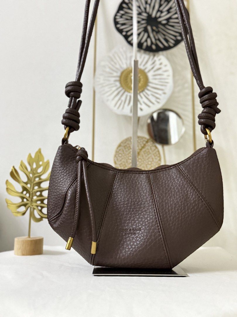 Croissant Convertible Bag (Category: Cross-body Bags) located in Cainta. Submitted by angellyy_ (Listing ID 1465282279, Image 1). Description: Korean Brand Croissant Bag Color: Choco brown Strap is Convertible to sling and shoulder bag Condition 10/10 Size - small Can fit up to slim medium wsllett.