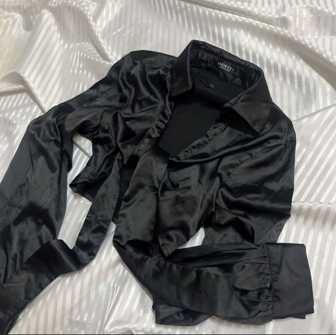 Cropped Satin Tie-front Longsleeves (Category: Longsleeves) located in Manila. Submitted by ave.archives (Listing ID 1465370837, Image 2). Description: Sleek black satin crop top featuring a classic collar and long sleeves designed with a chic adjustable tie-front wrap detail. Size: S-M |Condition: Like new Quezon City | Lalamove & J&T ready.