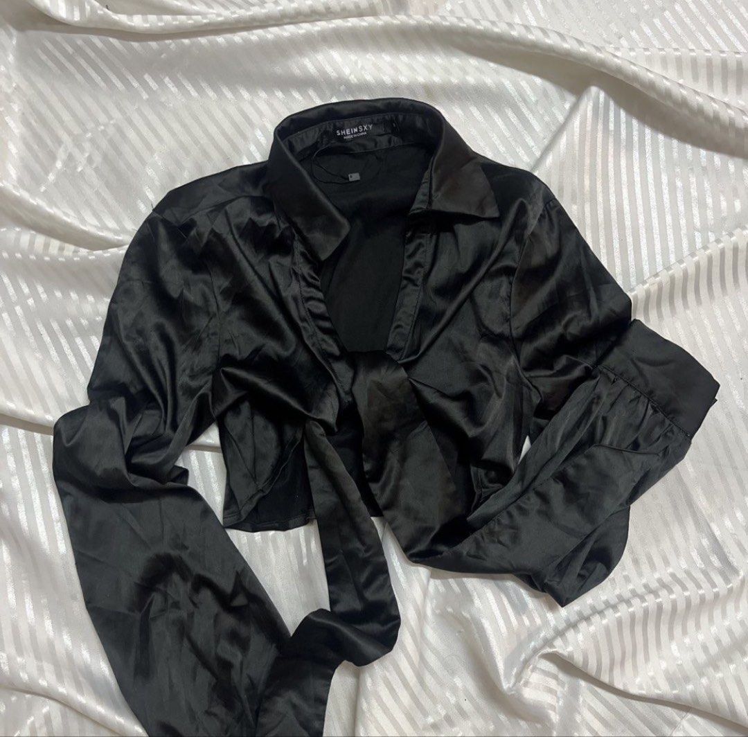 Cropped Satin Tie-front Longsleeves (Category: Longsleeves) located in Manila. Submitted by ave.archives (Listing ID 1465370837, Image 3). Description: Sleek black satin crop top featuring a classic collar and long sleeves designed with a chic adjustable tie-front wrap detail. Size: S-M |Condition: Like new Quezon City | Lalamove & J&T ready.