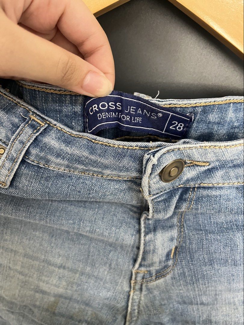 Cross Jeans Light Wash Denim Size 28 (Category: Jeans) located in Angeles City. Submitted by mochimochi1219 (Listing ID 1465198020, Image 2). Description: - Brand: Cross Jeans - Wash: Light blue with casual faded styling - Size: 28 (tagged inside waistband) - Closure: Classic button fly - Pockets: Functional front and back pockets - Material: Comfortable stretch denim - Condition: Excellent Size S-M Waistline 26-29.