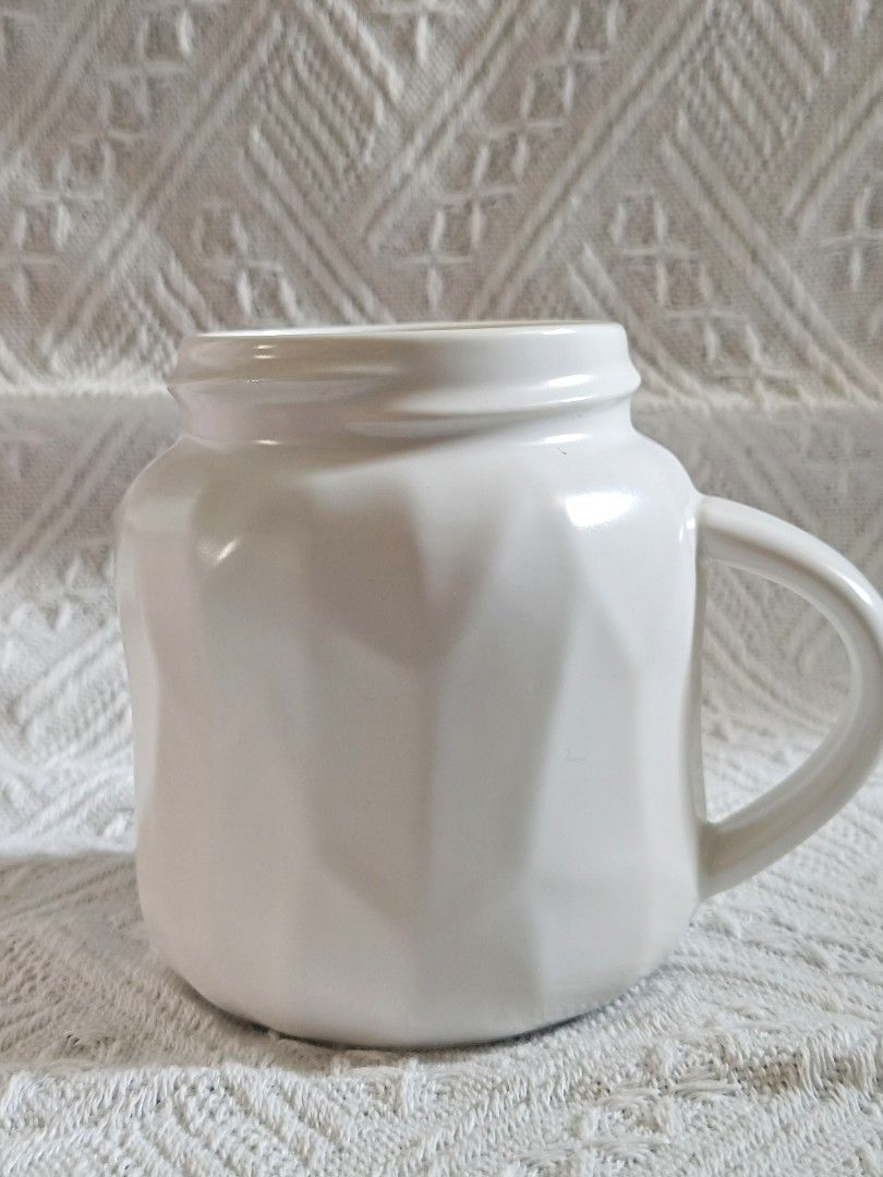 Cute, unique and plain with accent handle ceramic mugs (Category: Coffee & Tea Tableware) located in Davao. Submitted by khyyoczon (Listing ID 1465276581, Image 2). Description: - 100 pesos each - DM me first with your desired item to check if it’s still available. - Excellent condition - Perfect for gifts or personal use..