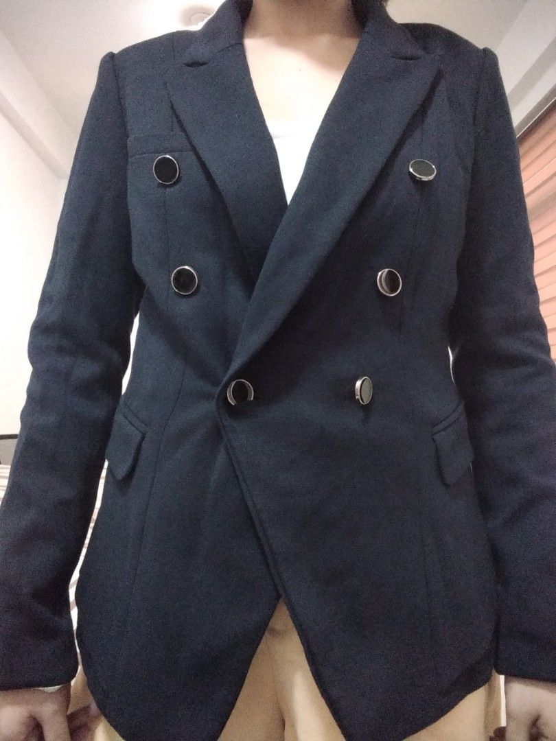 Dark blue double-breasted blazer (Category: Coats, Jackets and Outerwear) located in Marikina City. Submitted by newowners2025 (Listing ID 1465219312, Image 1). Description: Size: Small Shoulder: 16 in Length: 22 in - Thick fabric - With lining - No flaws/issues (still good as brand new) - double-breasted - Tailored fit - Smooth fabric - Two front pockets - Perfect for corporate/office/formal events .
