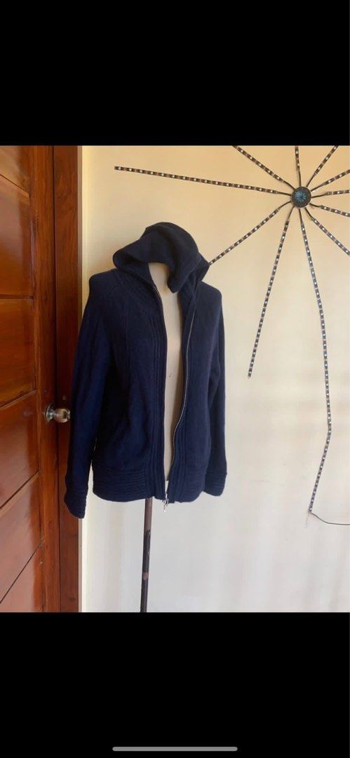 Dark Blue Hooded Zip Cardigan (Category: Coats, Jackets and Outerwear) located in Manila. Submitted by spaceshop12345 (Listing ID 1465309187, Image 2). Description: - Color: Solid dark blue / navy - Material: Thick, warm knit construction - Features: Built-in hood, full metal front zipper, two functional front pockets - Design: Ribbed texture panels along the front, hem, and cuffs - Condition: Excellent, ready to wear - Perfect for chilly weather