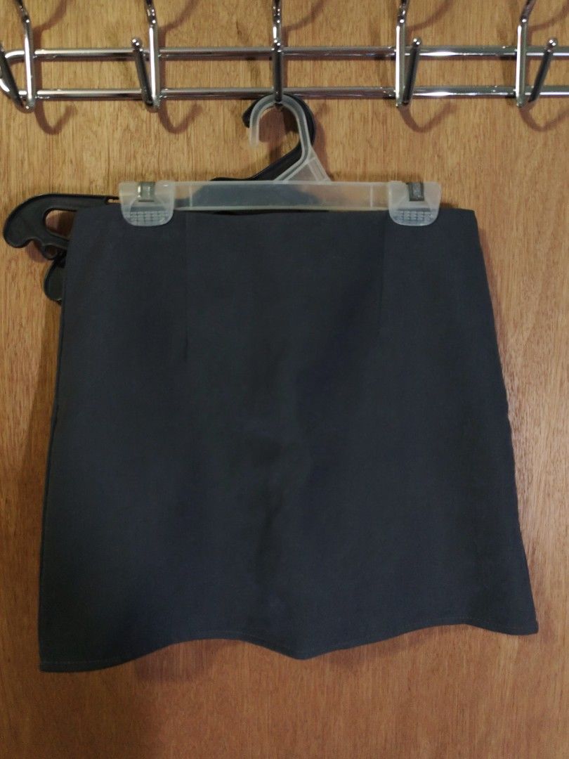 Dark Grey Skort with Inner Shorts (Category: Skirts) located in Caloocan City. Submitted by wisegem-c6c7 (Listing ID 1465232235, Image 1). Description: SIZE 24-25 - Color: Dark grey - Design: Mini skirt with built-in black shorts underneath for extra coverage - Waistband: Hidden elastic for a clean, comfortable fit - Fabric: Smooth and mid-weight - Style: Versatile solid color, perfect for everyday outfits.