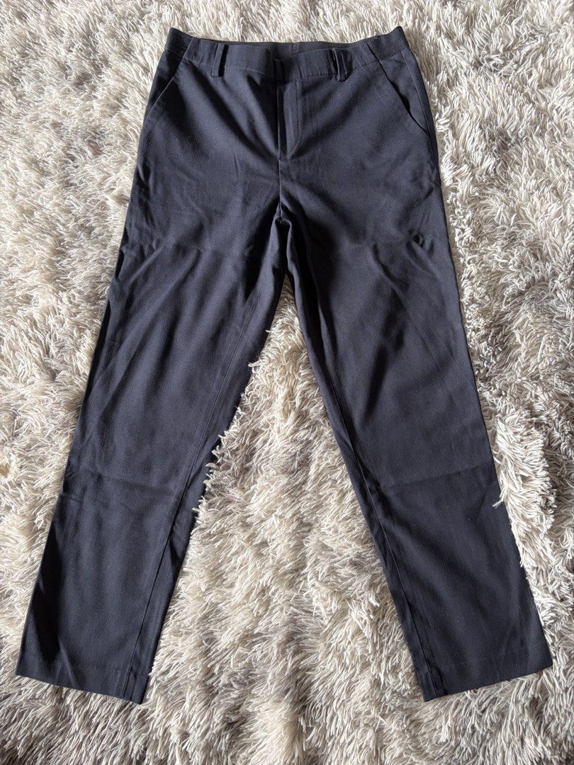 Dark Grey Tailored Trousers (Category: Other Bottoms) located in Manila. Submitted by kez0020 (Listing ID 1465222437, Image 2). Description: - Color: Dark Grey - Cut: Straight leg - Waist: Clean waistband with belt loops - Details: Subtle back pocket design - Fabric: Structured, smooth, and high-quality - Style: Great staple piece for work or casual setups - Condition: Excellent / Ready to wear.