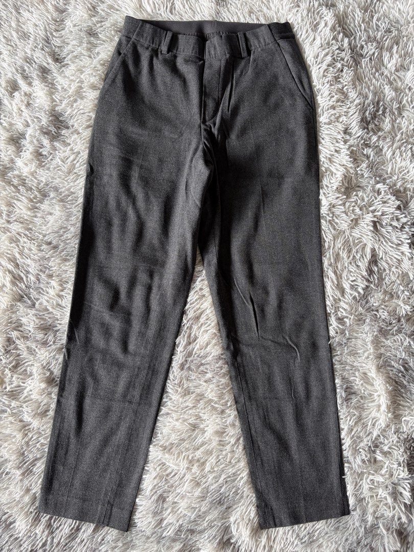 Dark Grey Tailored Trousers (Category: Other Bottoms) located in Manila. Submitted by kez0020 (Listing ID 1465227057, Image 1). Description: - Color: Dark Grey - Fit: Straight leg cut - Style: Minimalist, clean front - Features: Side pockets, belt loops - Closure: Standard button and zip fly - Versatility: Great for work or casual days.