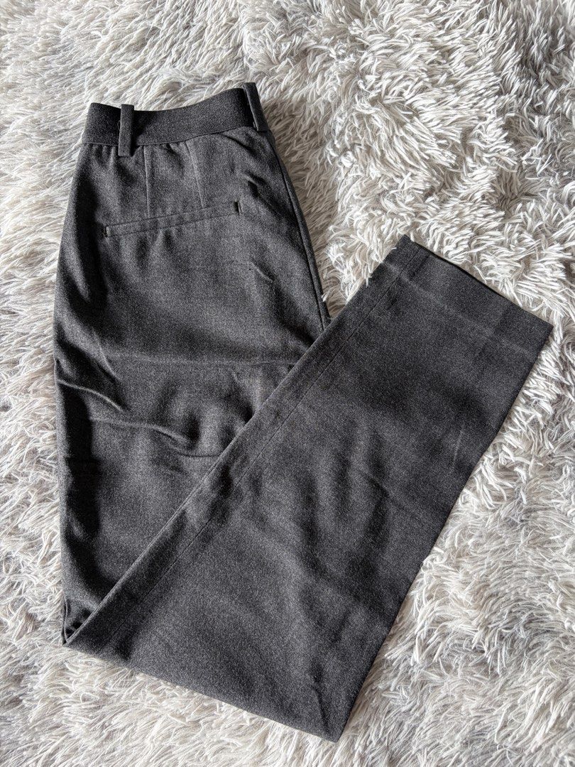 Dark Grey Tailored Trousers (Category: Other Bottoms) located in Manila. Submitted by kez0020 (Listing ID 1465227057, Image 3). Description: - Color: Dark Grey - Fit: Straight leg cut - Style: Minimalist, clean front - Features: Side pockets, belt loops - Closure: Standard button and zip fly - Versatility: Great for work or casual days.