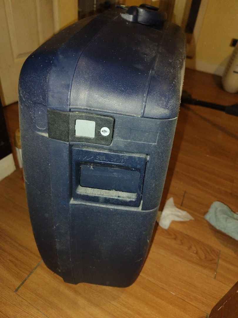 Delsey Hard Shell Suitcase Blue (Category: Luggage) located in Manila. Submitted by silentstar-0f4b (Listing ID 1465282121, Image 2). Description: - Brand: Delsey - Color: Dark Blue - Material: Solid hard shell plastic - Security: Built-in combination lock next to the handle - Hardware: Heavy-duty handle and latch mechanism - Condition: Good overall, with minor dust and surface marks from storage - Size: Ideal for medium to long trips.