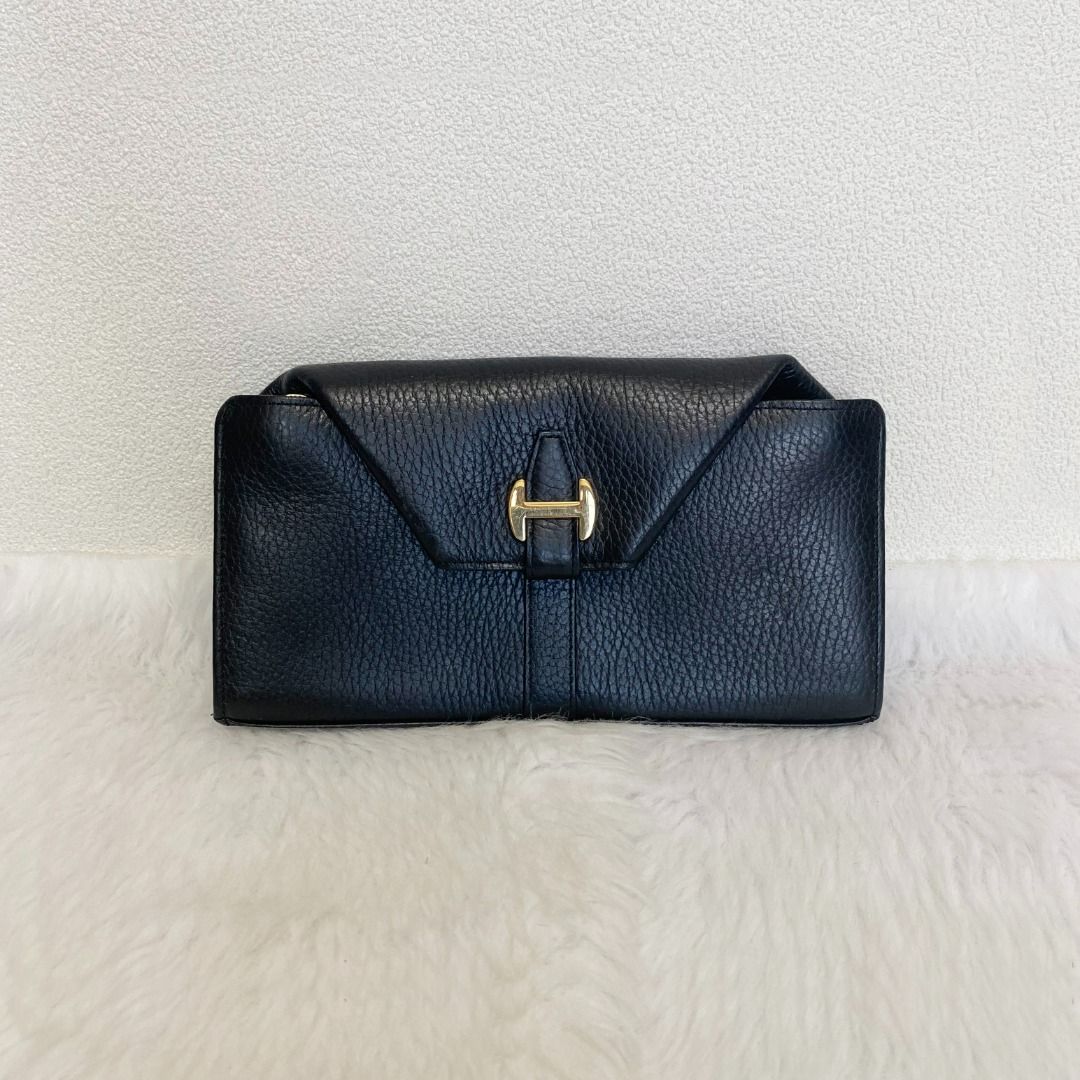 Den Hamano Black Leather Long Wallet (Category: Wallets & Card holders) located in Cebu City. Submitted by posh_avenue888 (Listing ID 1465301115, Image 1). Description: In very good condition. From Japan. Crafted in genuine leather. 100% authentic!!! 8" x 4"..
