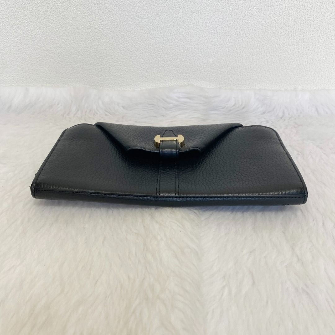 Den Hamano Black Leather Long Wallet (Category: Wallets & Card holders) located in Cebu City. Submitted by posh_avenue888 (Listing ID 1465301115, Image 3). Description: In very good condition. From Japan. Crafted in genuine leather. 100% authentic!!! 8" x 4"..