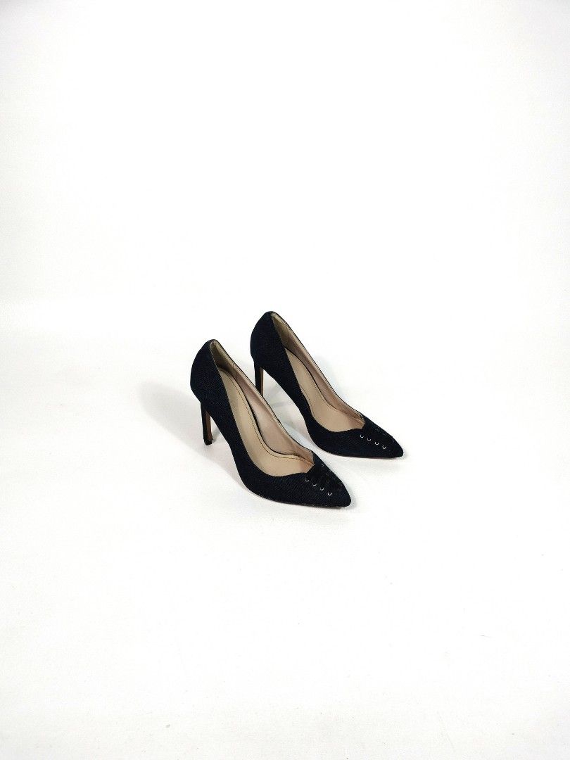 Diesel Denim Pointed Toe Stiletto Heels (Category: Heels) located in Manila. Submitted by callmetin (Listing ID 1465297289, Image 1). Description: Condition : Verygood Size Heels : 4inch Marerial : Denim Diesel denim high heels with stiletto heel. Dark blue wash material. Pointed toe design featuring decorative lace-up grommet details near the tips. Tan leather lining inside. Diesel logo printed on the insole. Classic pumps silhouette. Great stat