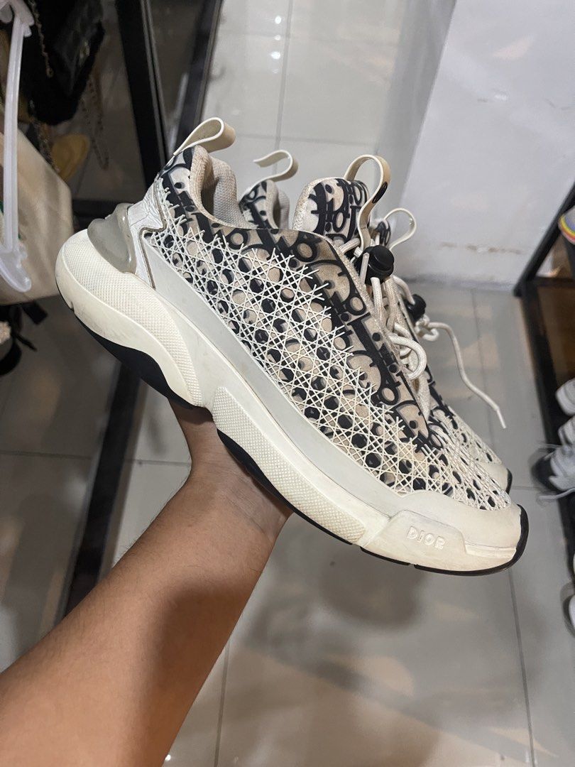 Dior B22 Sneaker Black White Oblique Mesh (Category: Sneakers) located in Cavite. Submitted by thriftkicks3 (Listing ID 1465282550, Image 1). Description: - Brand: Dior B22 - Colorway: Classic Black and White Oblique Print - Size: EU 42 - Design: Chunky rubber sole, mesh and technical fabric upper, cord lacing system - Branding: Embossed 'CHRISTIAN DIOR' on heel and 'DIOR' on toe - Condition: Minor signs of wear on midsoles and laces.