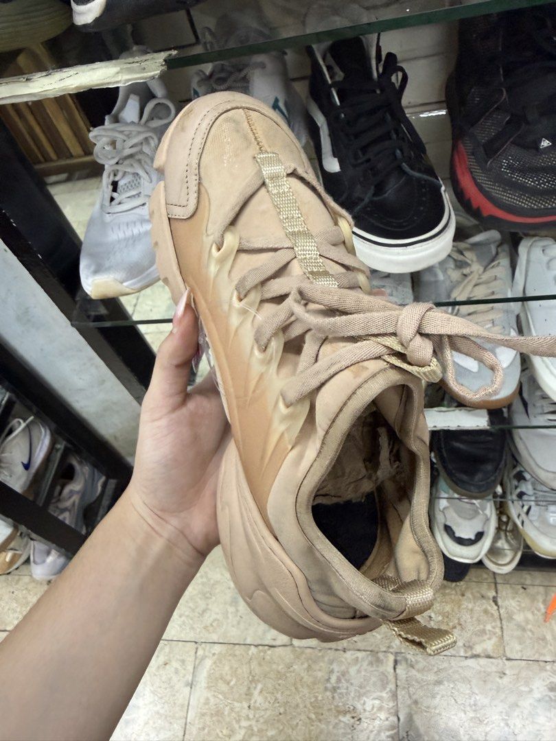 Dior Chunky Beige Sneakers (Category: Sneakers) located in Abucay. Submitted by fastlion.584bdf (Listing ID 1465360363, Image 3). Description: - Brand: Dior - Style: Chunky sneakers with thick sculpted soles and woven laces - Color: Versatile neutral beige (matches everything) - Details: Branded tongue and heel counter, convenient back pull tab - Condition: Noticeable wear on the upper fabric and midsole from regular use - Fit: Comfortable chunky