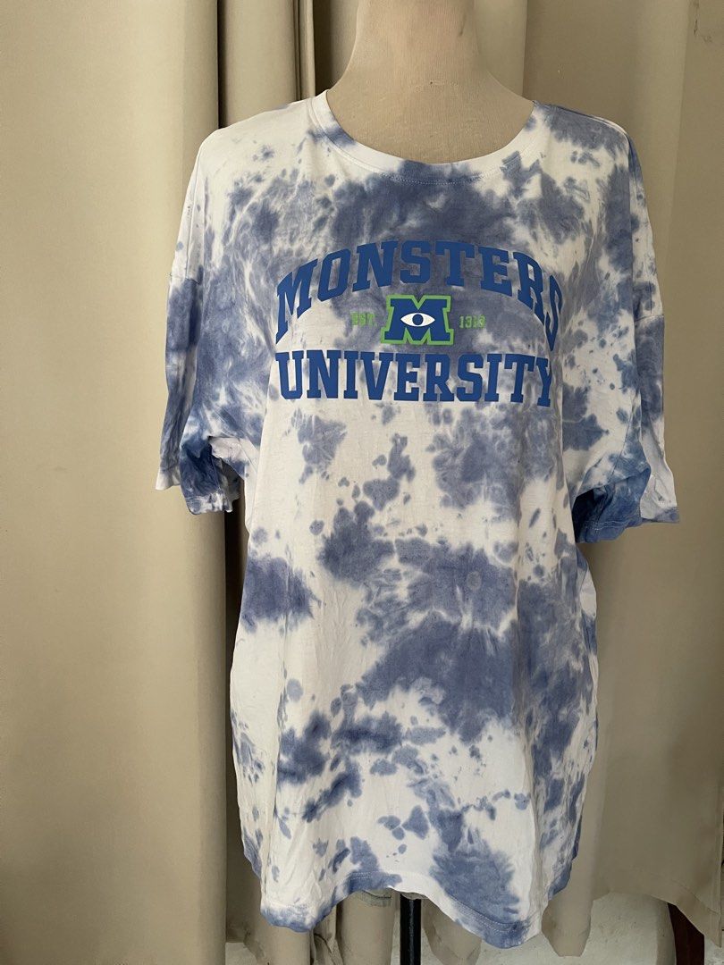 Disney Pixar MU MERCH (Category: Tshirts & Polo Shirts ) located in Cainta. Submitted by zlove111 (Listing ID 1465171925, Image 1). Description: - Authentic Disney Pixar Monsters University graphic t-shirt - Cool blue and white all-over tie-dye wash - Fun collegiate-style front print - Classic crew neck and short sleeves - Size: up to 2xl 24" - Condition: Brand new with tags attached.