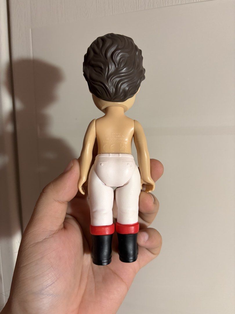 Disney’s Prince Eric Doll (Category: Figurines & Statues) located in Plaridel. Submitted by moddedjarvis (Listing ID 1465172219, Image 2). Description: - Brand/Maker: Disney by JAKKS Pacific - Appearance: Molded short brown hair, blue eyes, shirtless body - Outfit: Includes white pants and black boots with red trim (original shirt missing) - Condition: Loose figure, clean plastic limbs, and decent face paint - Authenticity: Back stamp includes Di