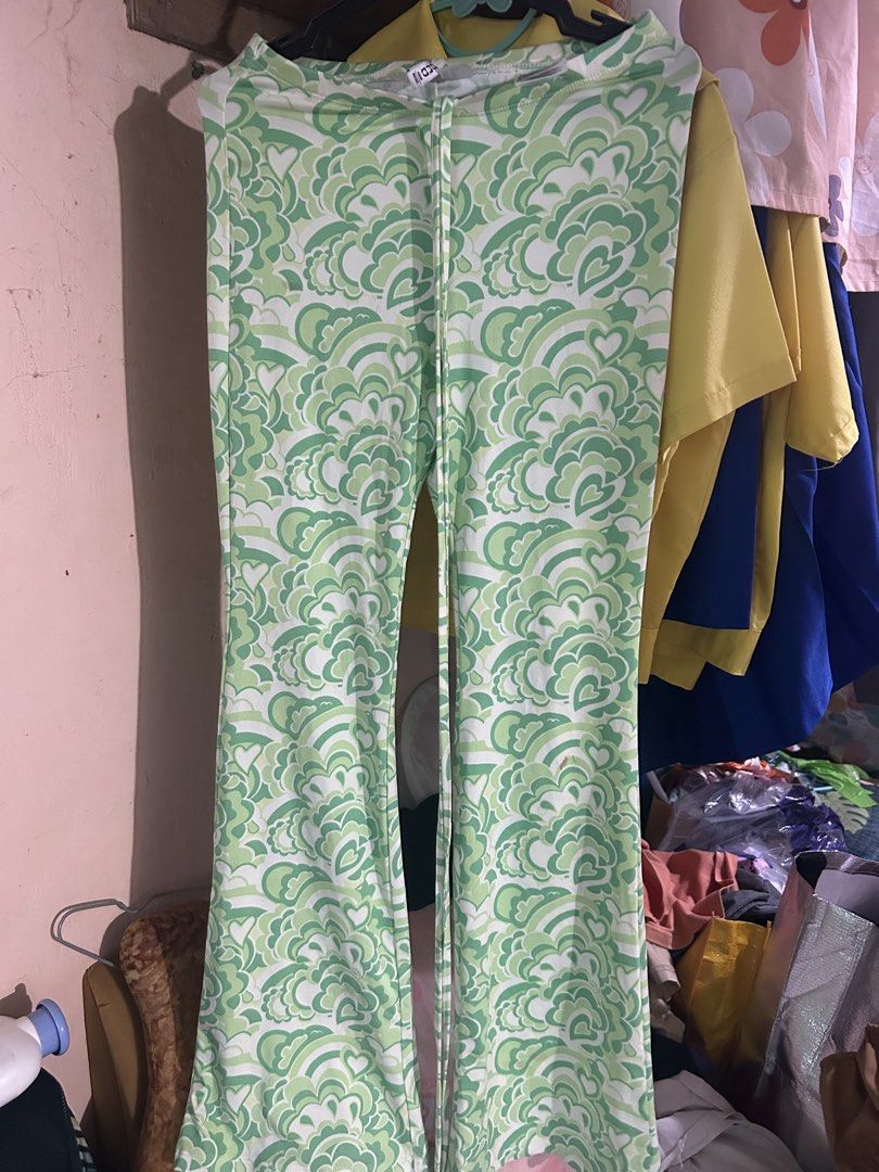 Divided H&M Patterned Flared Trousers (Category: Jeans) located in Mandaluyong City. Submitted by mariamadeline (Listing ID 1465343317, Image 1). Description: - Brand/Style: Divided by H&M green and white patterned flared trousers - Size: XS - Flaws: A few slightly noticeable brownish stains near the front waistline and upper leg area (please check all photos closely) - Never been used but stains might somehow be removed by washing.