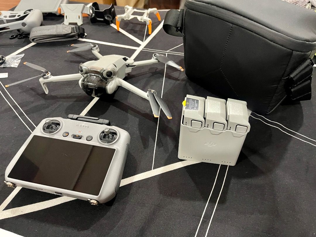 DJI Mini 4 Pro Fly More Combo + RC 2 - 1-2 Cycles Only + Full Accessory Bundle (Category: Drones) located in Manila. Submitted by draedavid28 (Listing ID 1465182069, Image 3). Description: Selling my DJI Mini 4 Pro Fly More Combo with DJI RC 2 (screen controller). Barely used - battery cycles are 2, 1, 1. No crashes, no issues. Inclusions: • Mini 4 Pro drone • DJI RC 2 controller • 3x batteries + charging hub • Hard carry case + extra shoulder ba