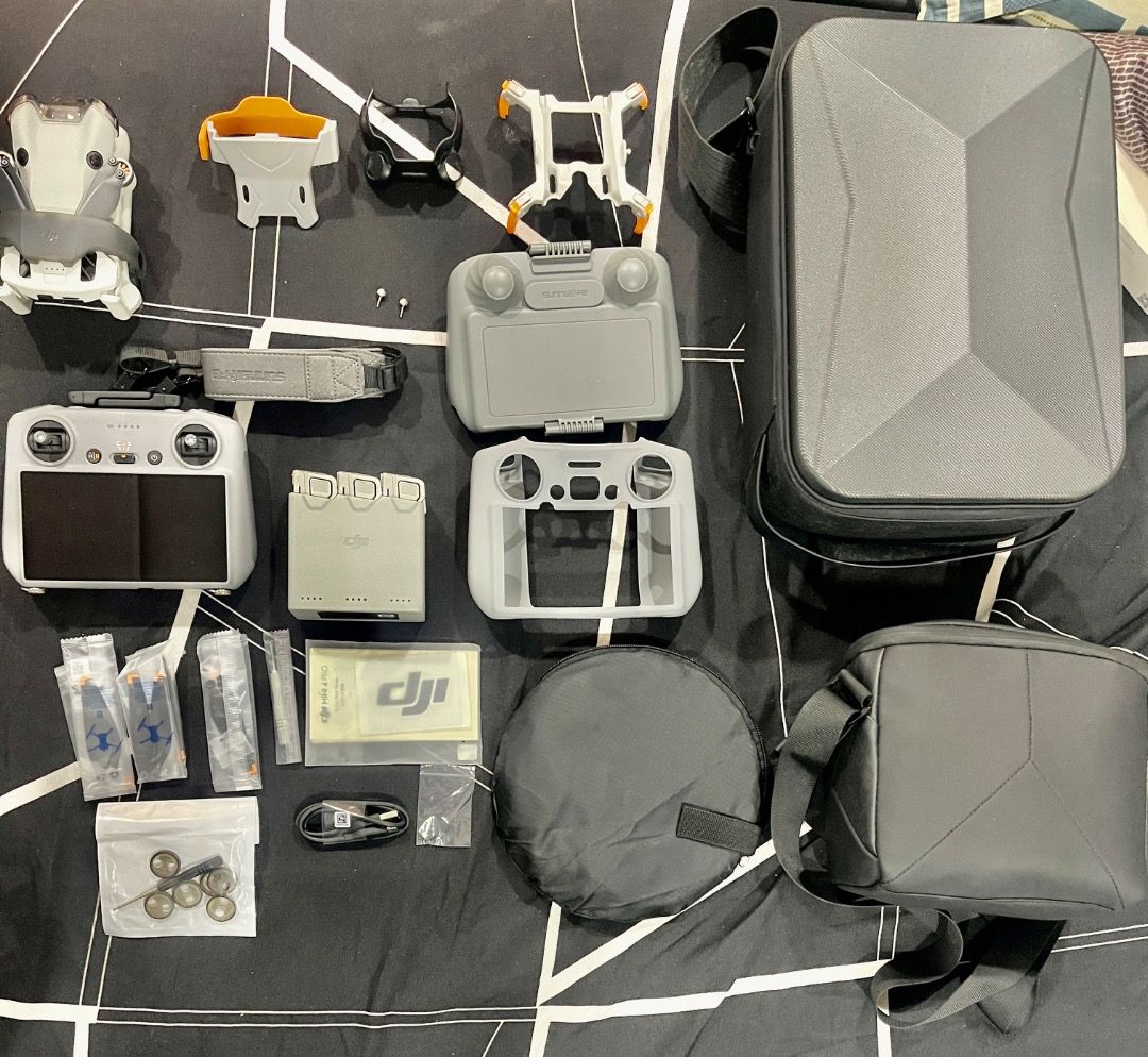 DJI Mini 4 Pro Fly More Combo + RC 2 - 1-2 Cycles Only + Full Accessory Bundle (Category: Drones) located in Manila. Submitted by draedavid28 (Listing ID 1465182069, Image 2). Description: Selling my DJI Mini 4 Pro Fly More Combo with DJI RC 2 (screen controller). Barely used - battery cycles are 2, 1, 1. No crashes, no issues. Inclusions: • Mini 4 Pro drone • DJI RC 2 controller • 3x batteries + charging hub • Hard carry case + extra shoulder ba