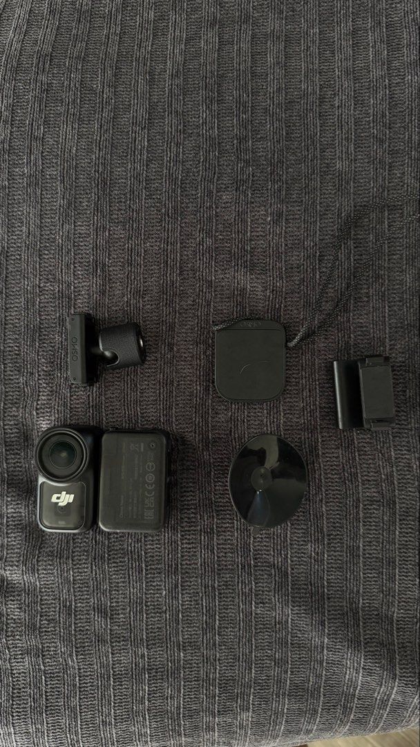 DJI Osmo Nano 128gb (Category: Video Cameras) located in Manila. Submitted by jaredsibay94460 (Listing ID 1465171436, Image 1). Description: - Complete DJI Osmo action camera bundle for sports, vlogging, and travel - Includes base battery unit, magnetic neck strap lanyard, suction cup mount, and clip mount - Fully tested and works great - Everything pictured is included in the package - used only once.