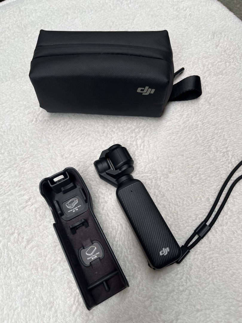 DJI Osmo Pocket 3 Creator Combo (Category: Video Cameras) located in Manila. Submitted by trustycart_ (Listing ID 1465256078, Image 2). Description: 📸 DJI Osmo Pocket 3 Creator Combo ✨ Details / Inclusions: - DJI Osmo Pocket 3 - Osmo Pocket 3 Battery Handle - DJI Mic 2 Transmitter - DJI Mic 2 Windscreen - DJI Mic 2 Clip Magnet - Osmo Pocket 3 Wide-Angle Lens - Osmo Mini Tripod - Osmo Pocket 3 Handle With 1/4” Thread - Osmo Pocket 3 Protective Co