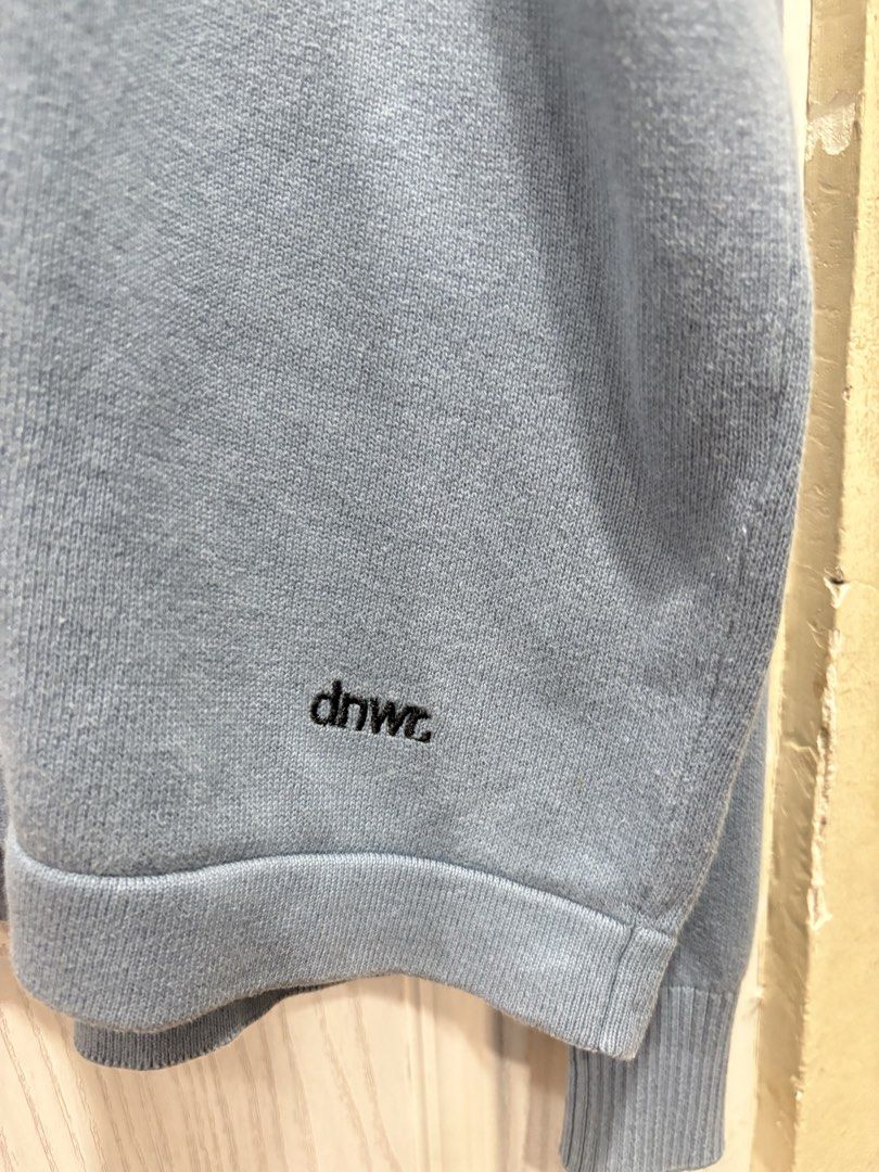 DNWR Light Blue Knit Sweater (Category: Sleep and Loungewear) located in Mandaluyong City. Submitted by shopwithjuu (Listing ID 1465284068, Image 2). Description: DNWC light blue knit sweater in a relaxed, oversized fit. Made from a soft, comfortable cotton blend with a crew neck and a small embroidered logo. Clean and ready to wear!.