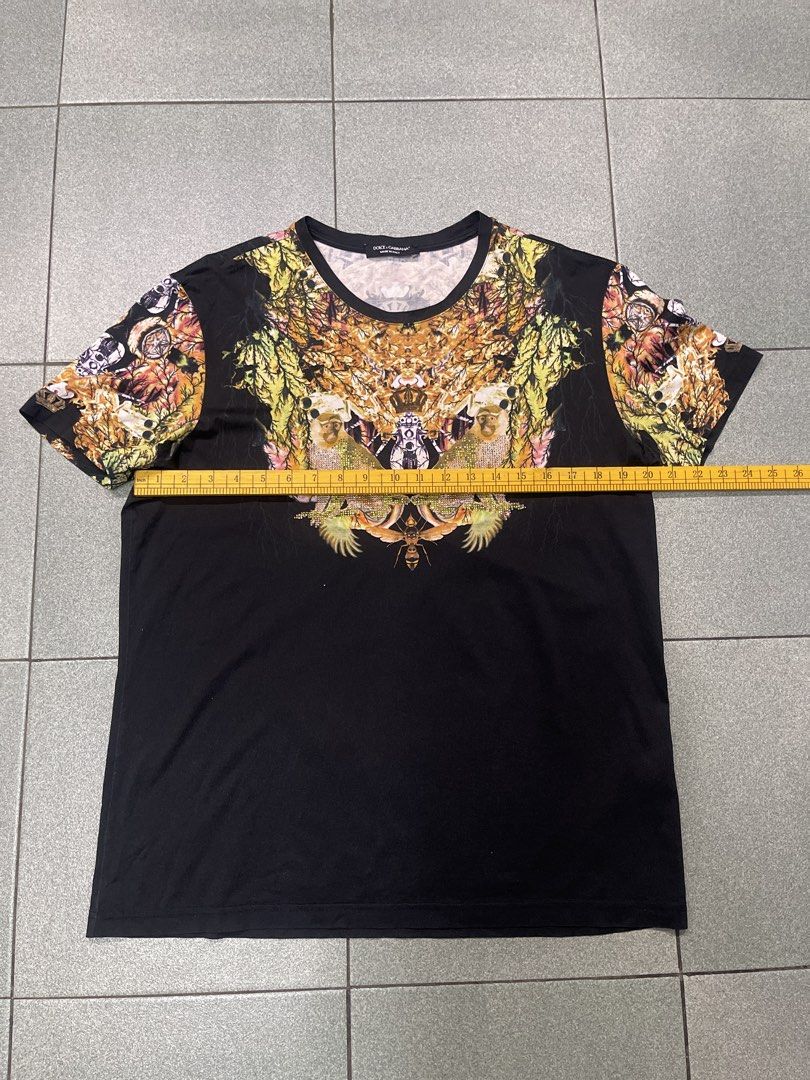 Dolce & Gabbana Monkey Print Graphic T-Shirt (Category: Tshirts & Polo Shirts ) located in Manila. Submitted by dailygetup (Listing ID 1465327596, Image 3). Description: - Brand: Dolce & Gabbana - Color: Black base with intricate jungle animal graphics - Special Features: Crystal embellishments on the monkeys and unique patterned sleeves - Origin: Made in Italy tag at the collar - Measurements (laid flat): Width approx. 21" across chest, Length a
