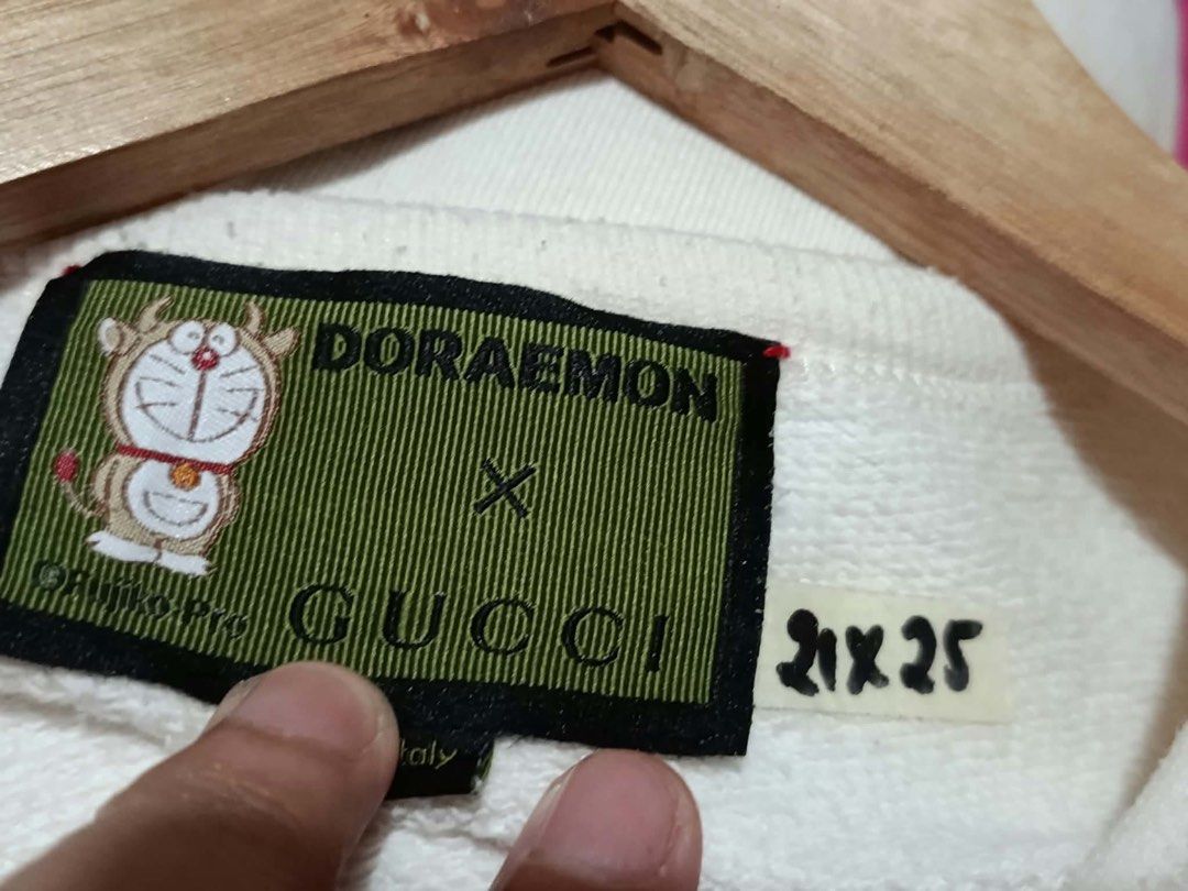 Doraemon x Gucci Pullover Sweatshirt (Category: Luxury Apparel) located in Guagua. Submitted by branded.thriftssss (Listing ID 1465305574, Image 2). Description: Excellent condition Colorate 10/10 No issue Dimes: 21x25 inches Pampanga loc J&t courier .
