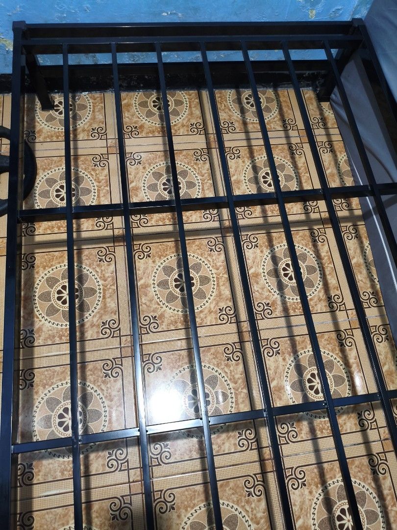 Double Bed Frame with Single Pull-Out Bed Frame (Category: Bed Frames & Mattresses) located in Pasig City. Submitted by hello_vvorld (Listing ID 1465326625, Image 3). Description: Hello! I'm selling this double-sized bed frame with a single-sized pull-out bed frame from CarbonSteel for only ₱3,499. I’m selling it because I recently moved to a place with a loft bed, and the frame makes the bedroom feel a bit cramped. I bought this bed frame in Dec